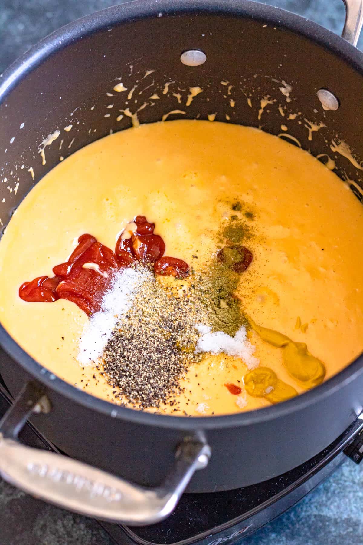 Ketchup, seasonings, mustard added to the roux. 