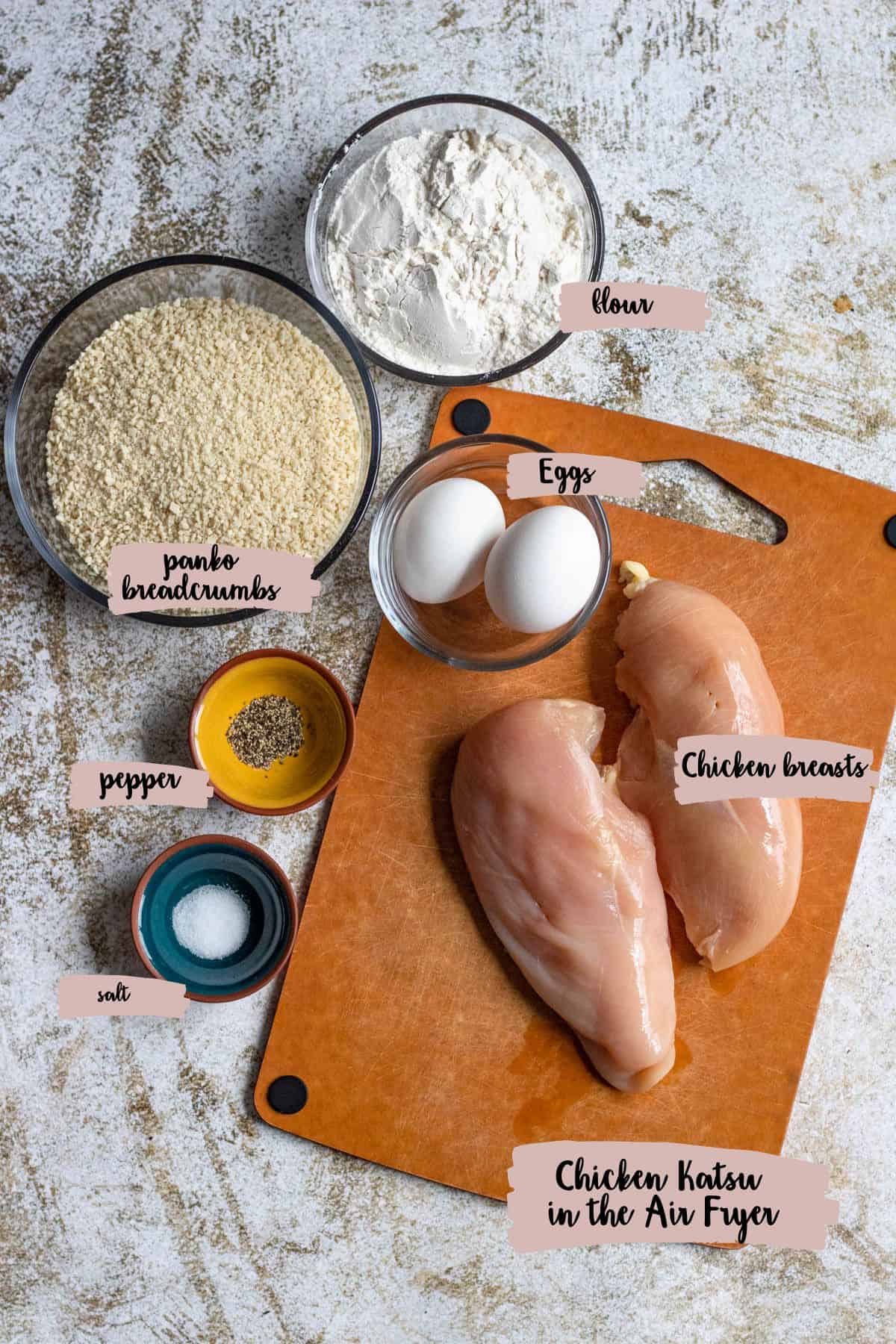 Ingredients shown are used to prepare chicken katsu in the air fryer. 