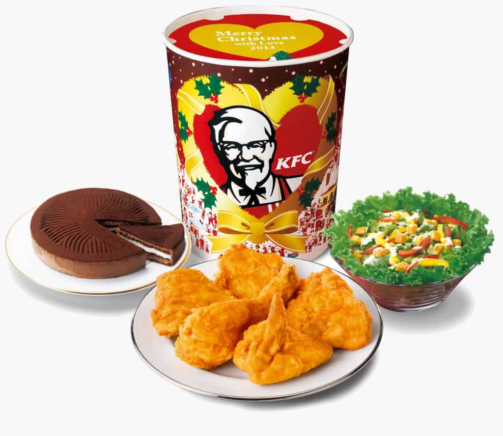 Foods often served in Japan at Christmas such as KFC bucket of chicken, salad, cake. 