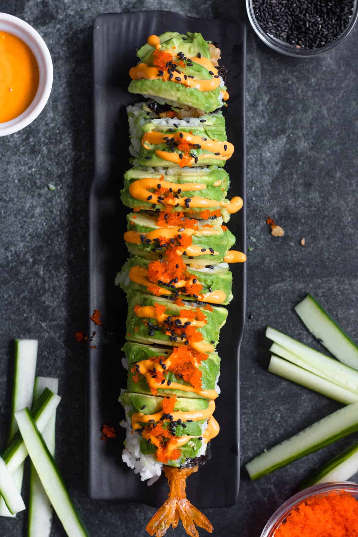 Top view of dragon roll cut into bites. 