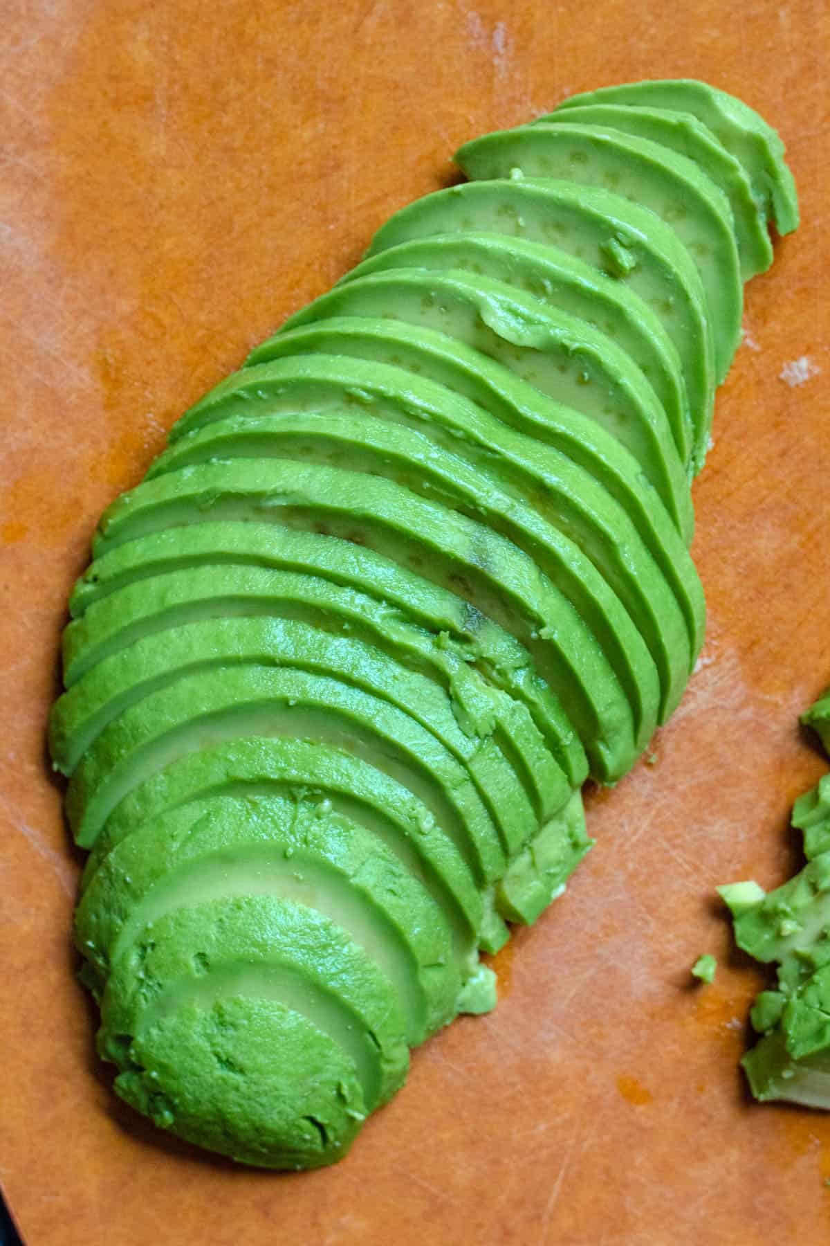 Fresh avocado removed from the skin and thinly sliced. 