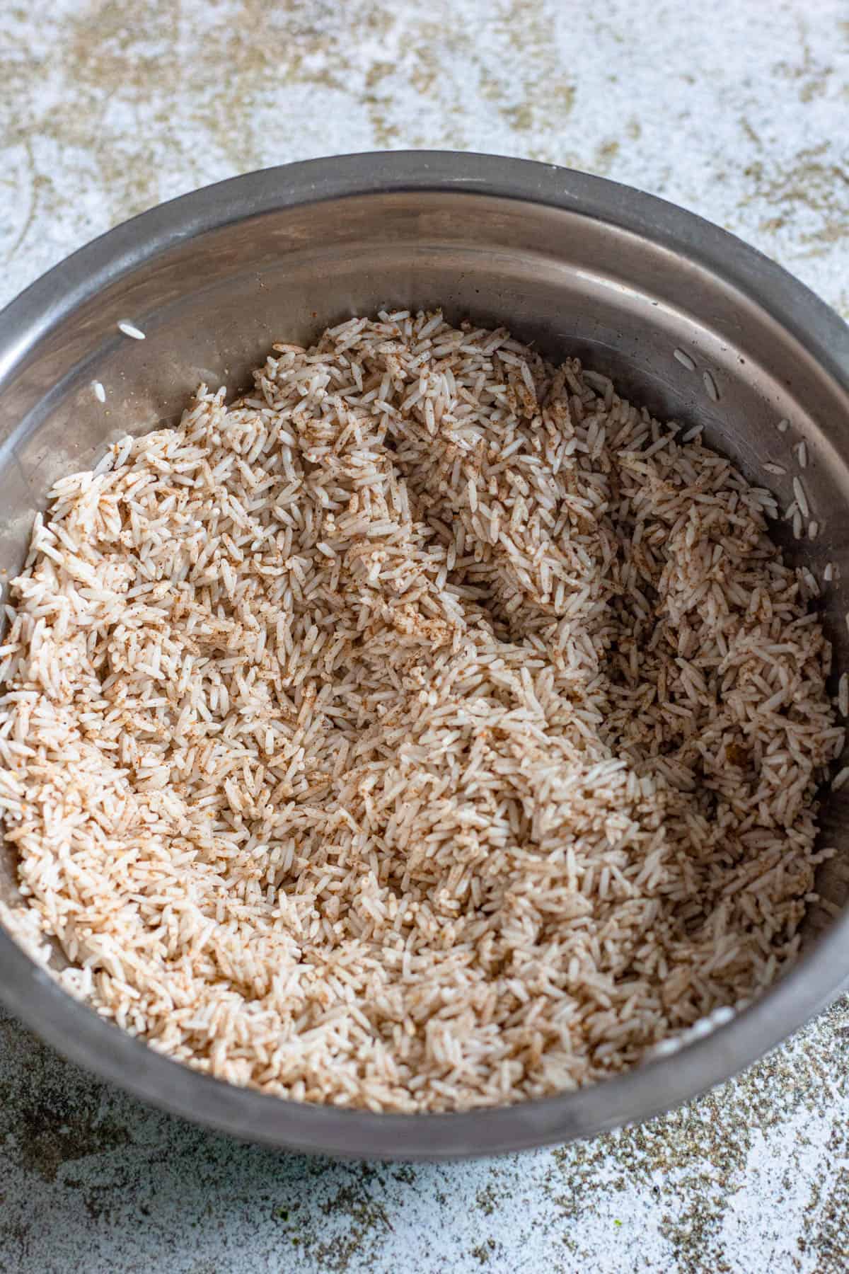 Seasoned rice in a pan. 