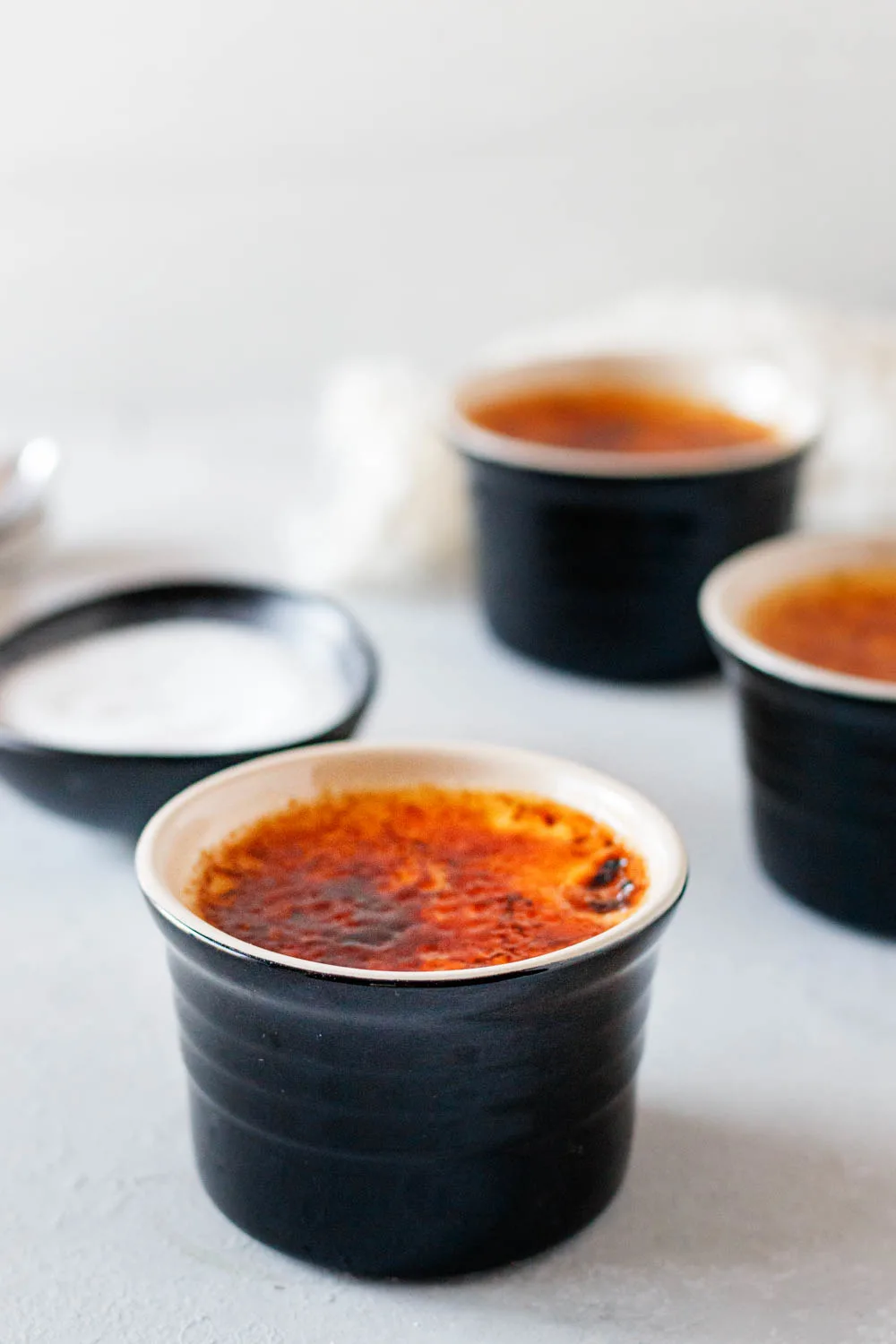 Irish Cream creme brulee in small glass containers. 