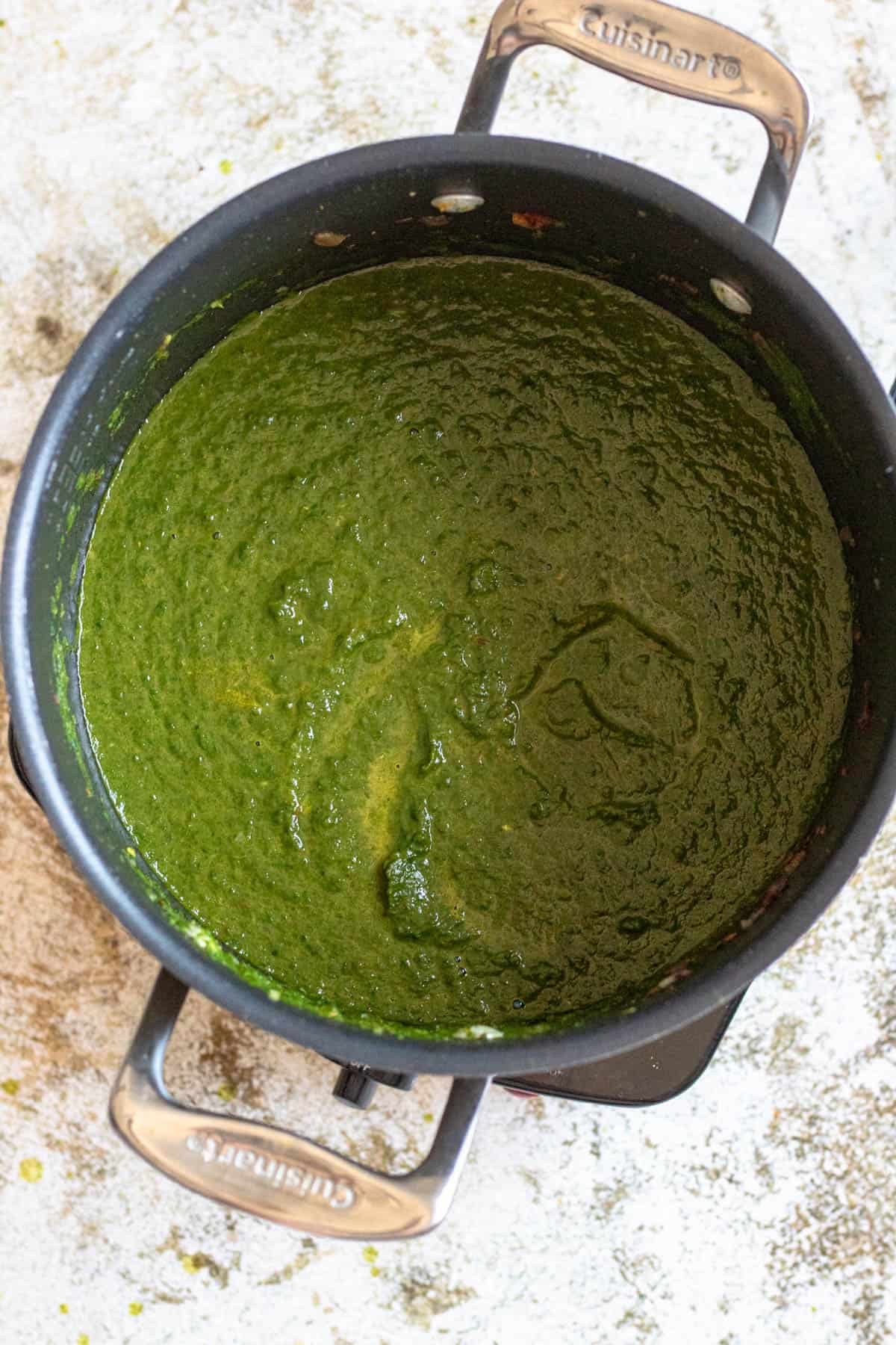 Palak ingredients blended with an immersion blender. 