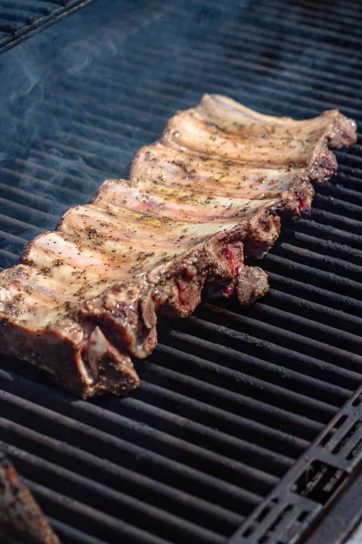 Baked nyama choma on a grill, finishing cooking. 