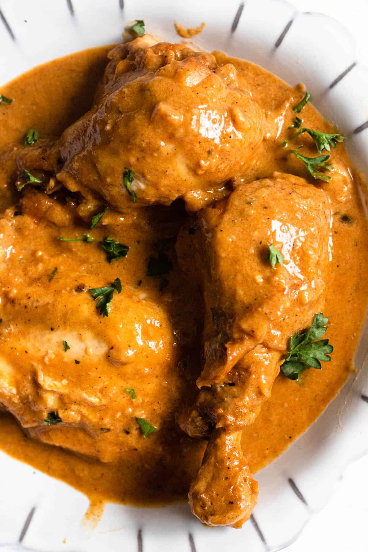 Close up of Chicken paprikash recipe served on a plate. 
