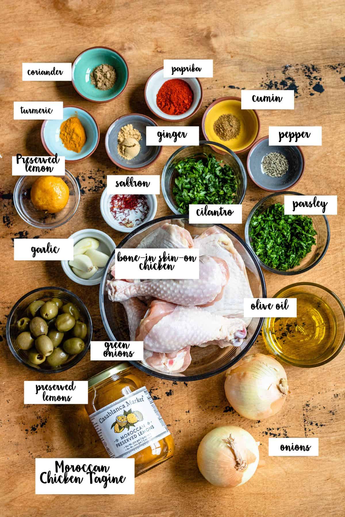 Ingredients shown are used to prepare Moroccan chicken tagine recipe. 