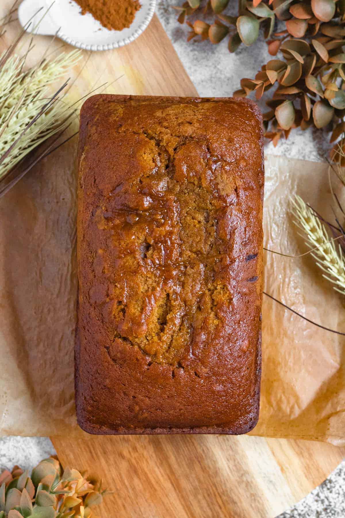 Top view of a baked pumpkin bread loaf.
