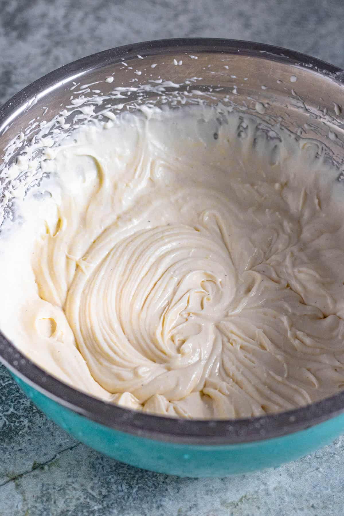 A smooth cannoli dip in a mixing bowl. 