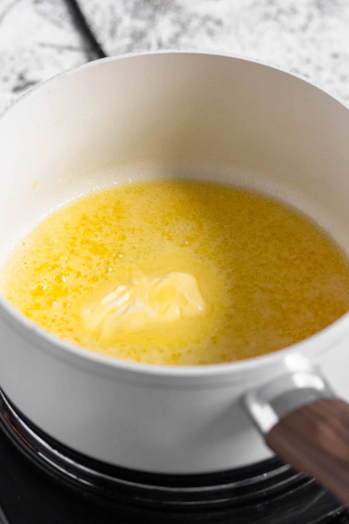 Butter melted in a saucepan. 