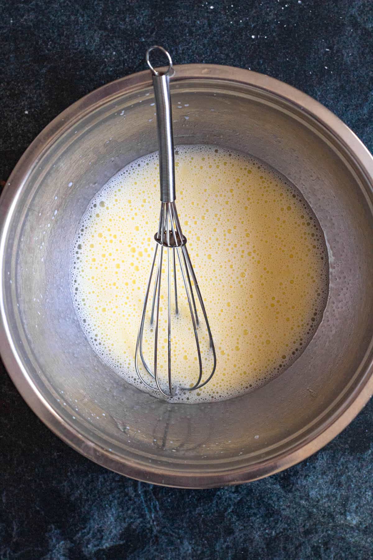 Melted butter in a mixing bowl. 