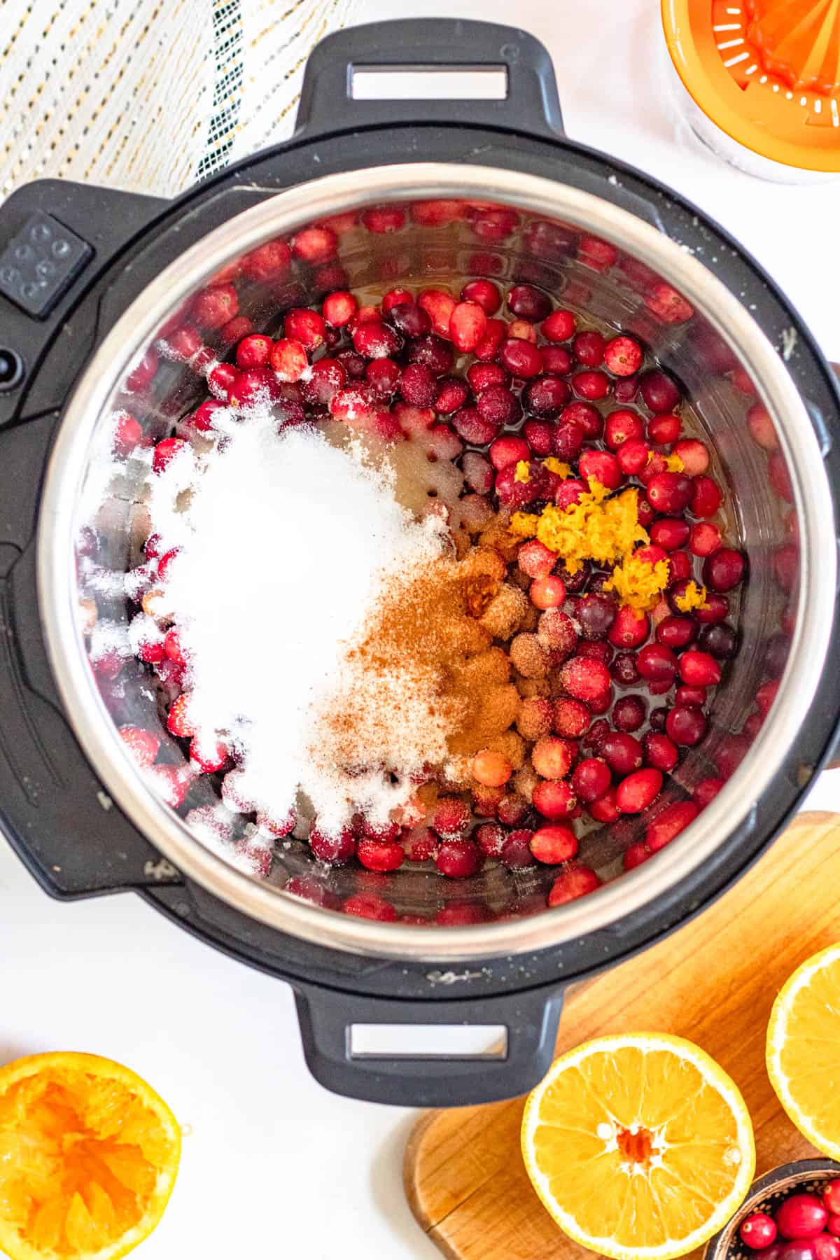 All instant pot cranberry sauce ingredients added to the pot. 