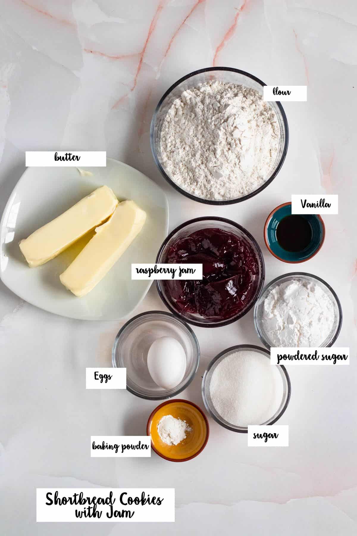 Iingredients shown are used to prepare sables, or shortbread cookies with jam.