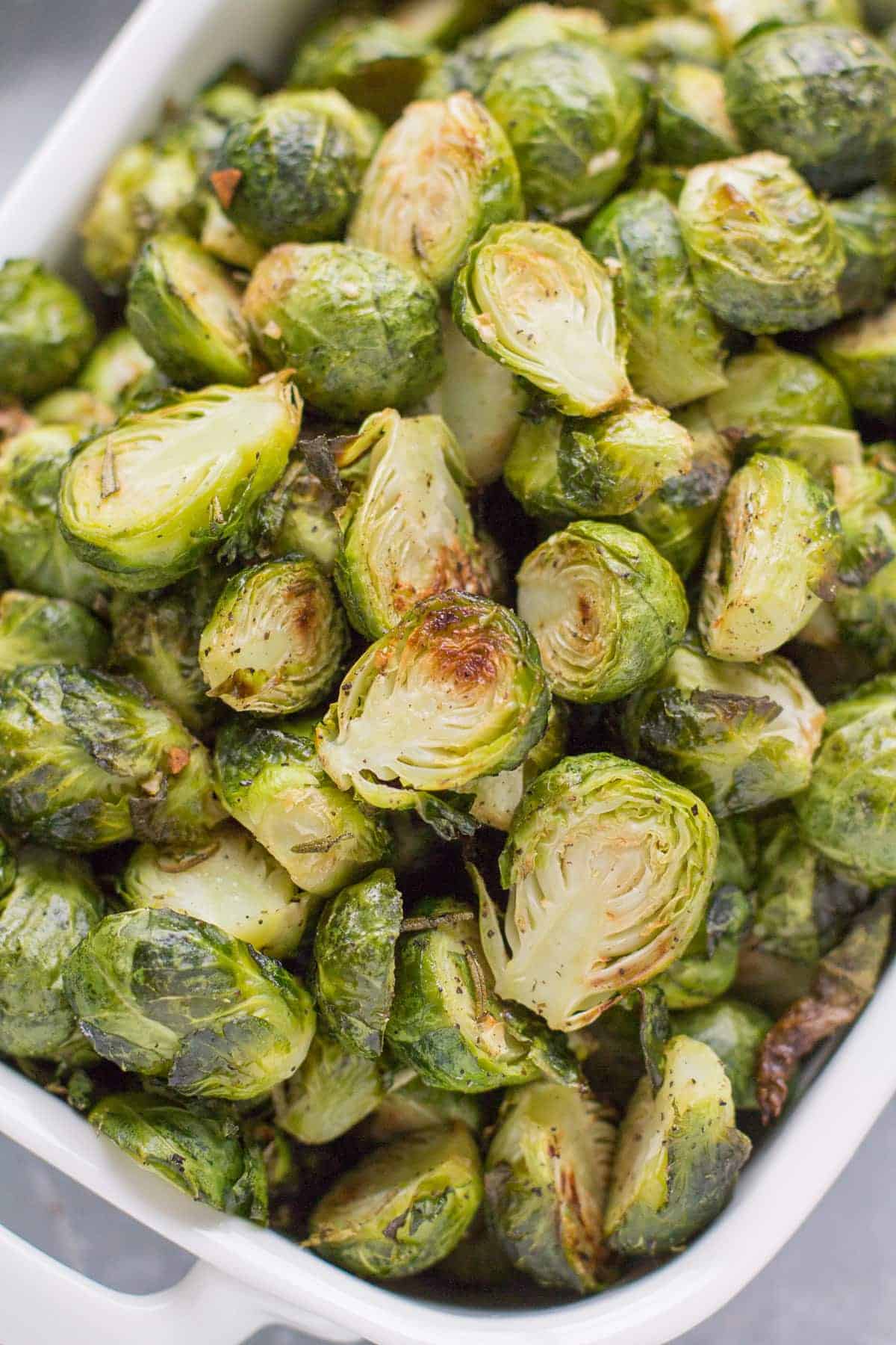 Roasted garlic brussels sprouts on a platter. 