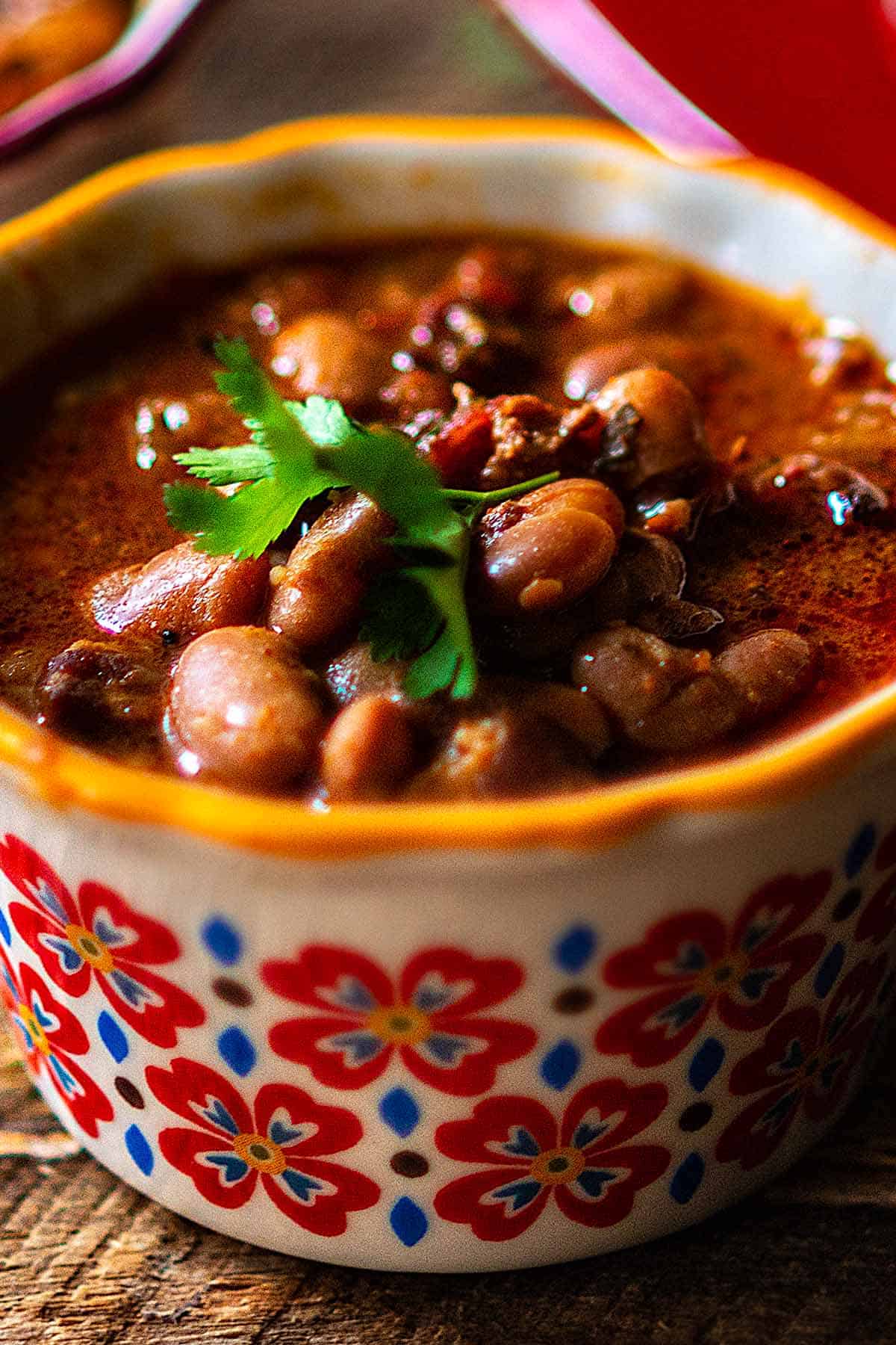 Instant pot charro beans in a bowl, ready to serve. 