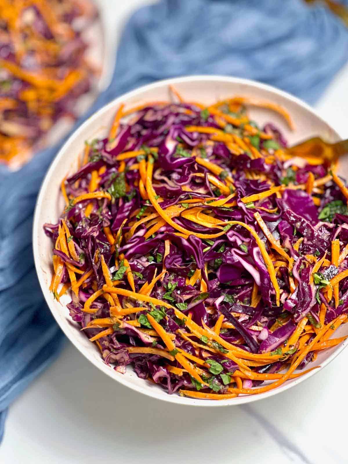 Purple cabbage salad without mayo in a bowl to serve. 