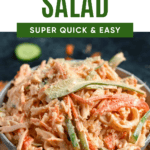 Pinterest image of Kani Salad in a bowl, sitting on a cutting board.