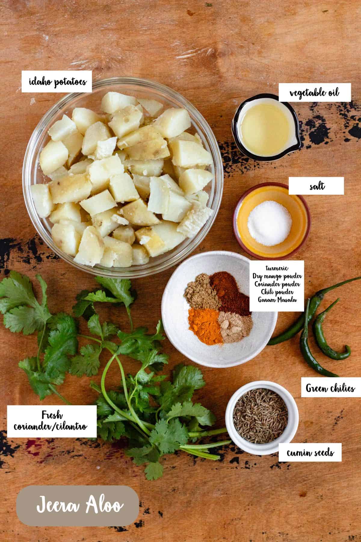 Ingredient shot of ingredients to make Jeera Aloo.