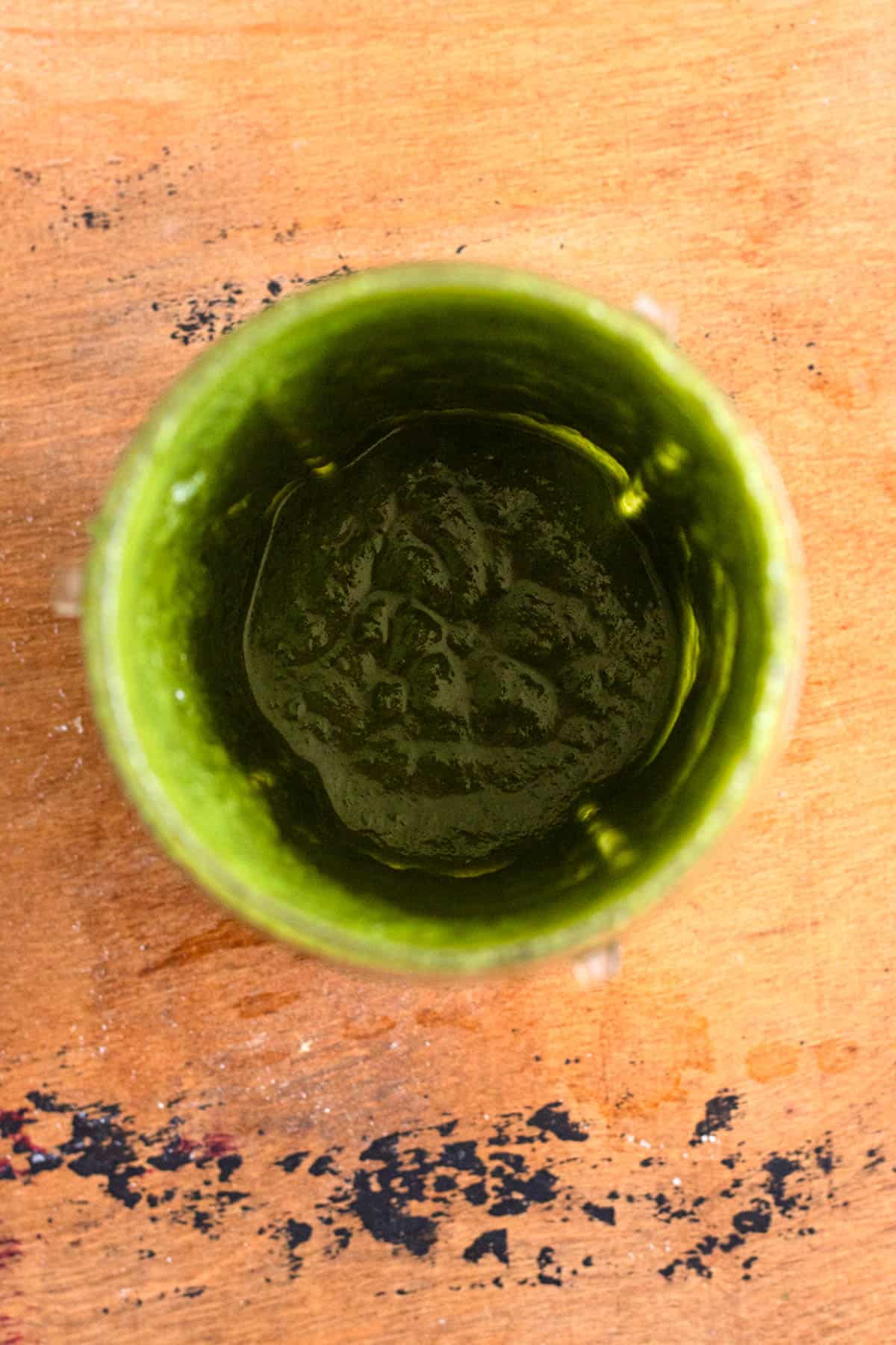 A Nutribullet filled with well-blended walnut pesto.