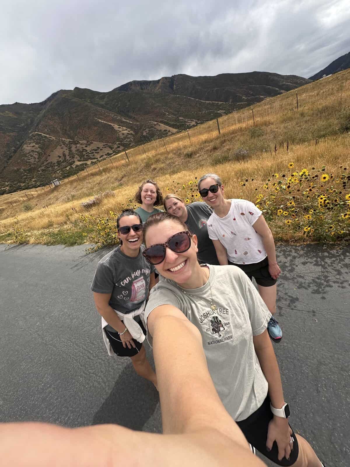 Five girls on a walk taking a selfie together