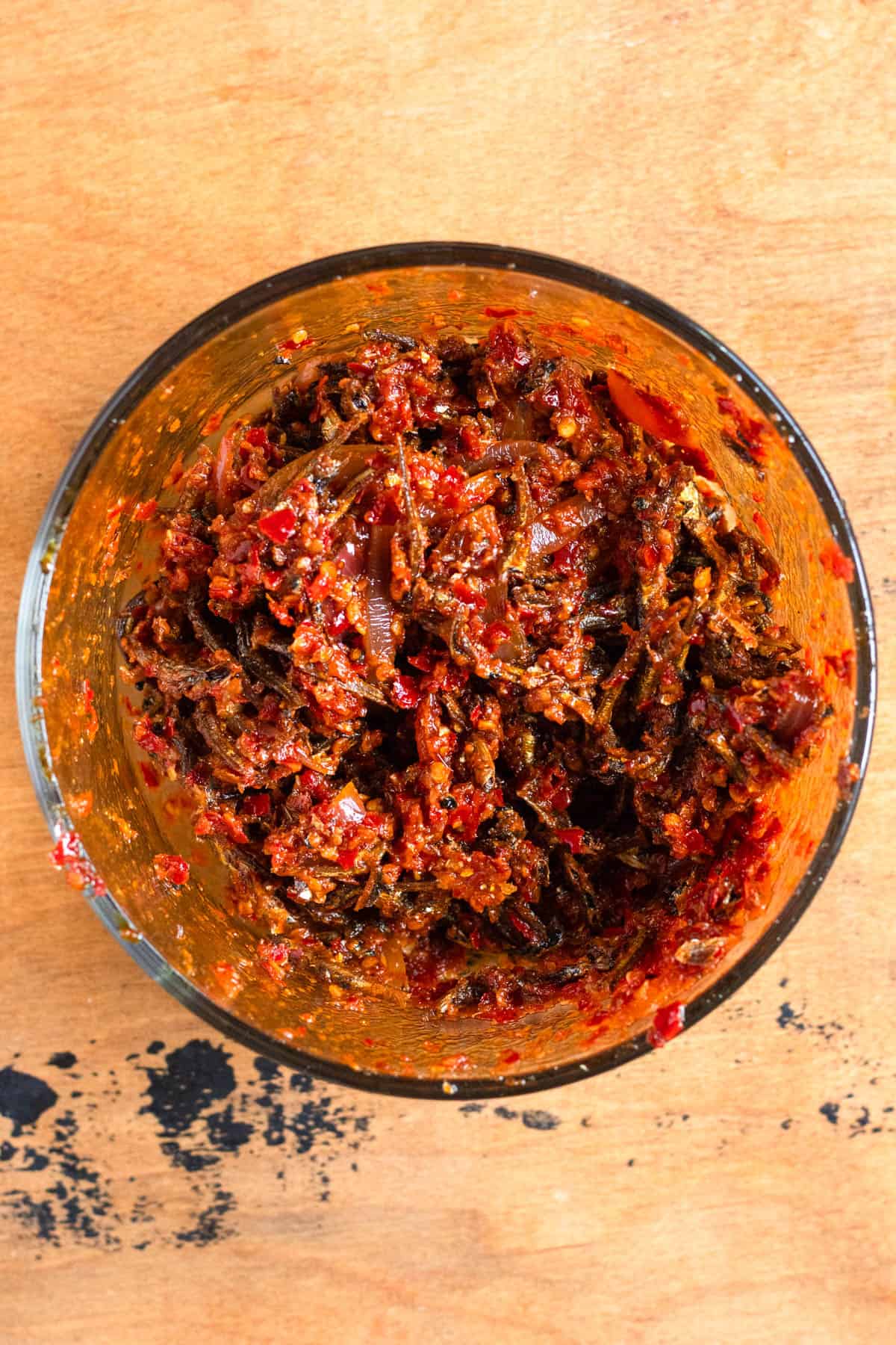 Crispy fried anchovies mixed with spicy sambal belacan.