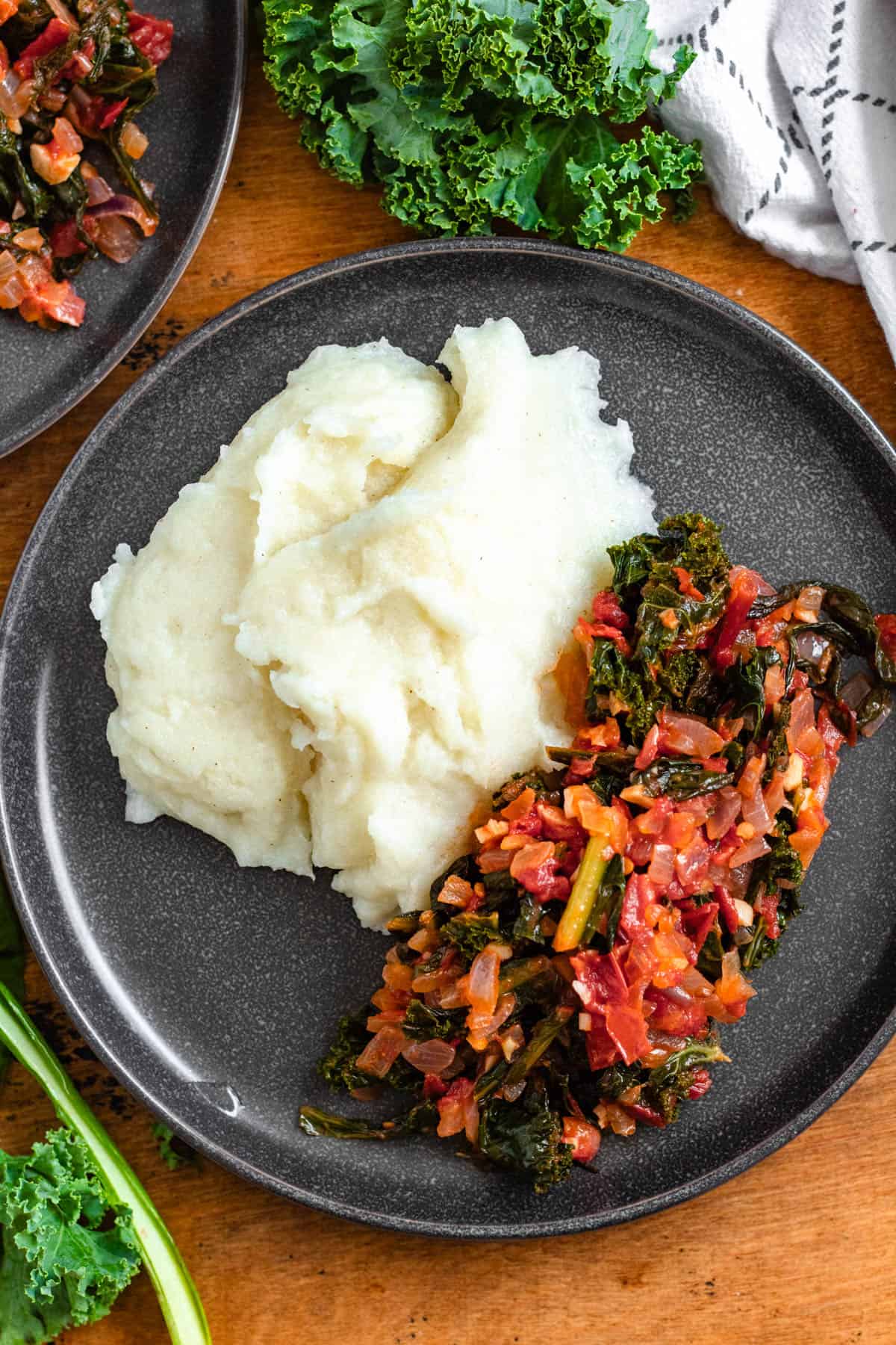 A plate of smooth Nsima served with flavorful Ndiwo.