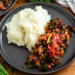 A plate of smooth Nsima served with flavorful Ndiwo.