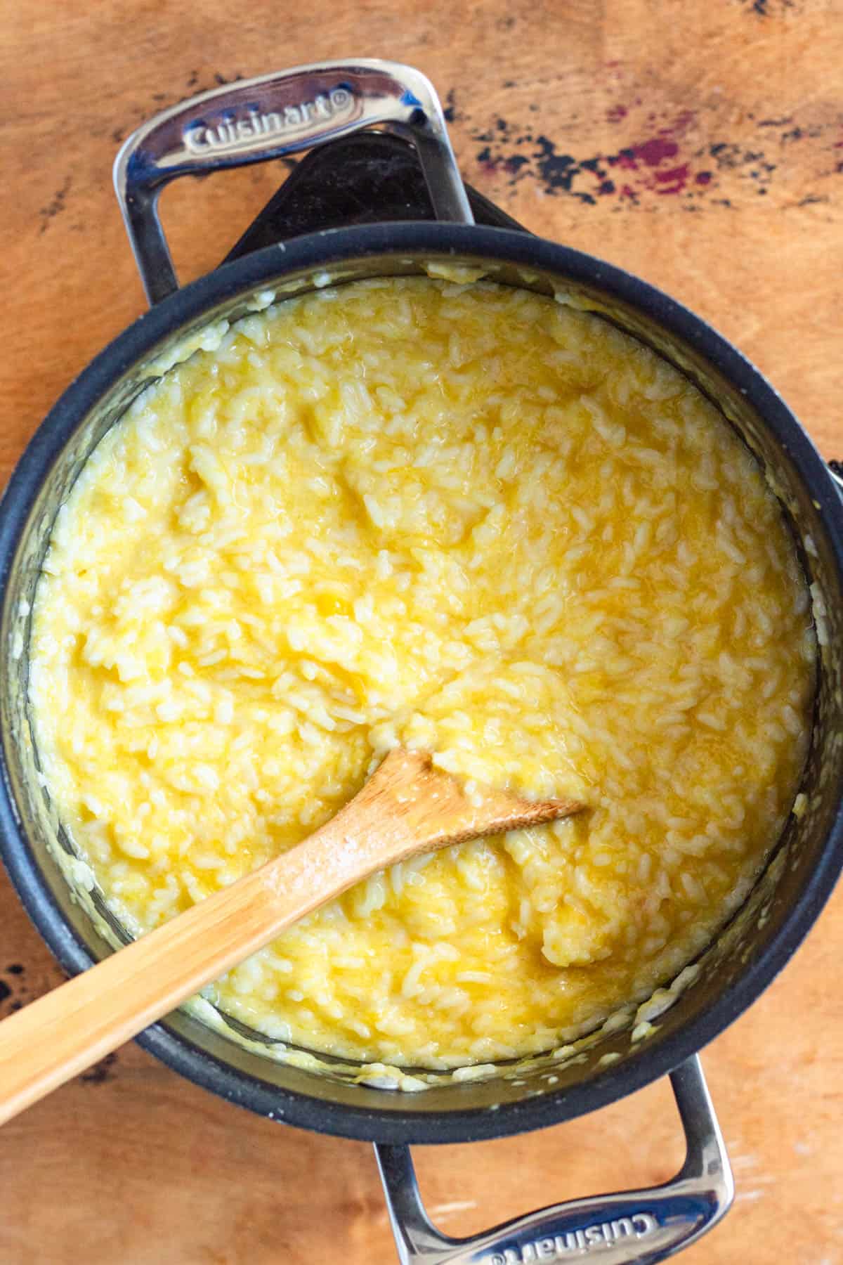 A pot of thick and creamy pumpkin rice.