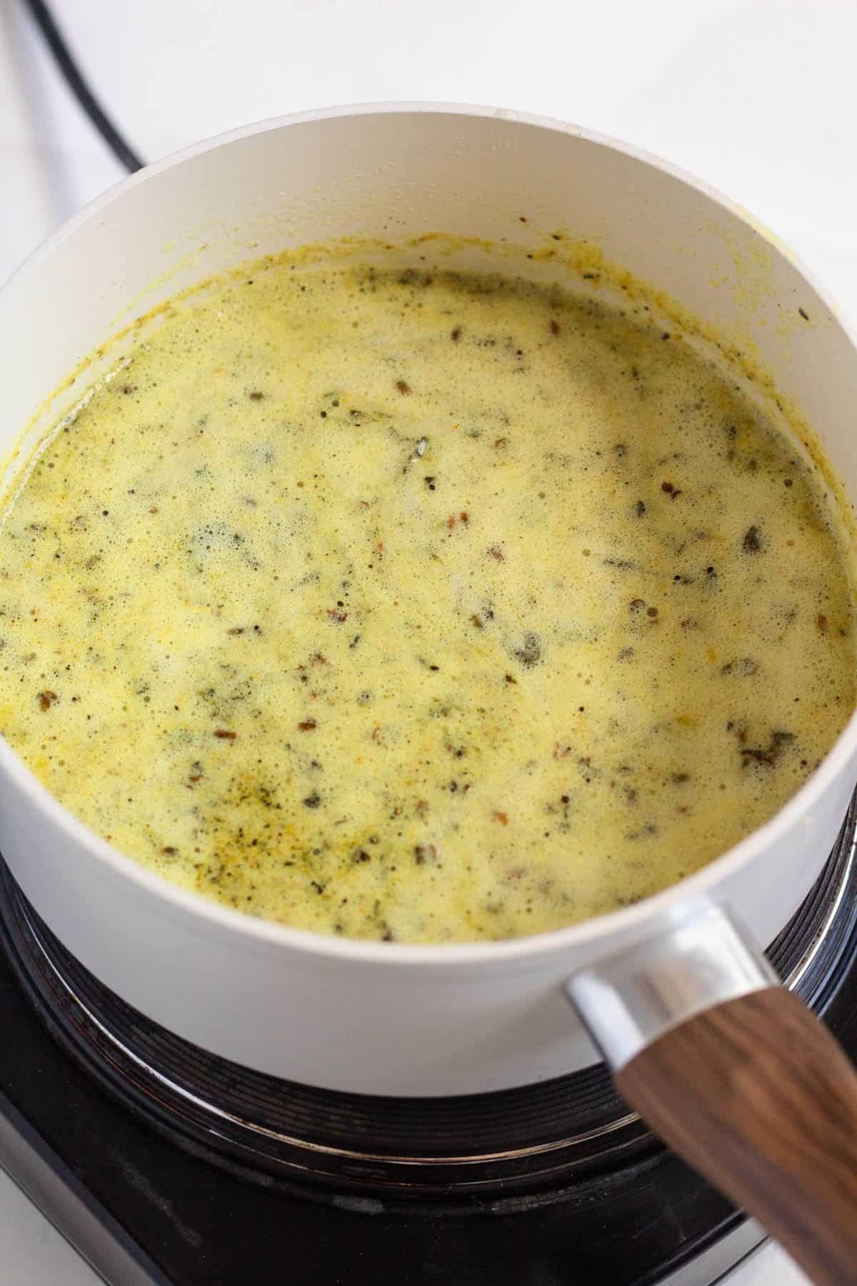 Butter simmering in a pot.
