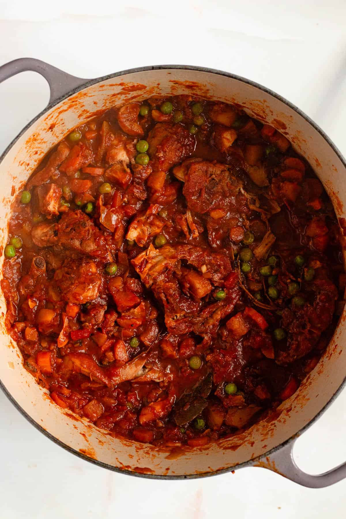 Rabbit Stew gently simmering in the pot.