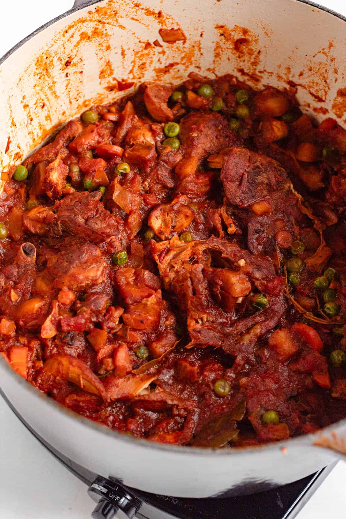 Peas stirred into the simmering Rabbit Stew.