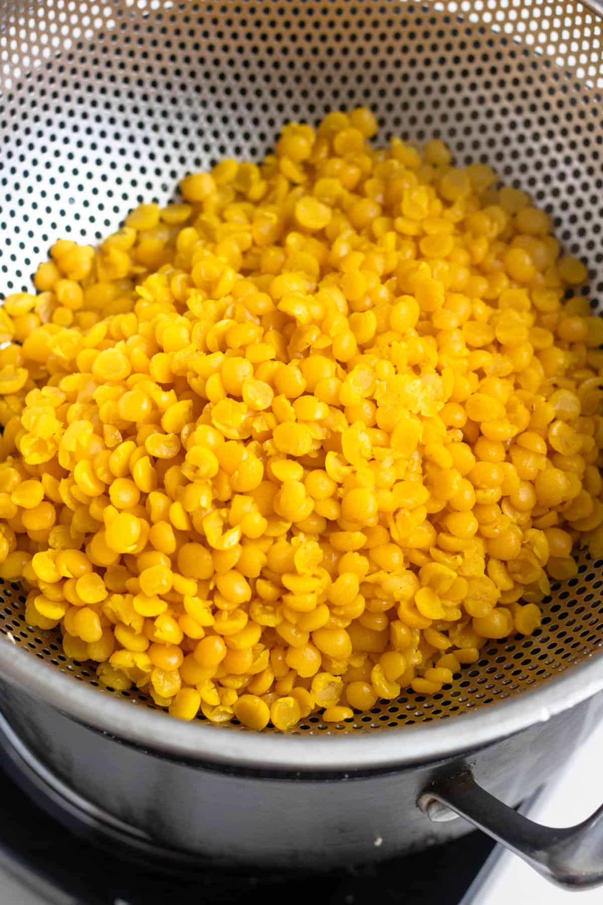 Cooked split peas, drained with the liquid set aside.