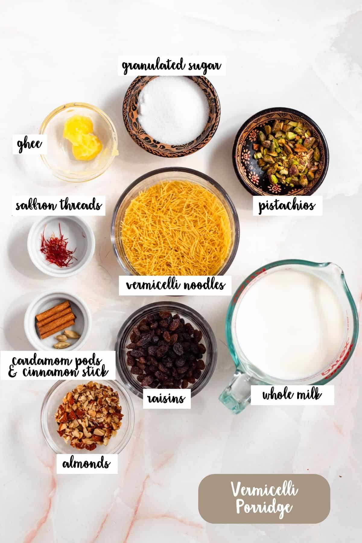 Top-down view of ingredients for Vermicelli Porridge including milk, nuts, and spices.