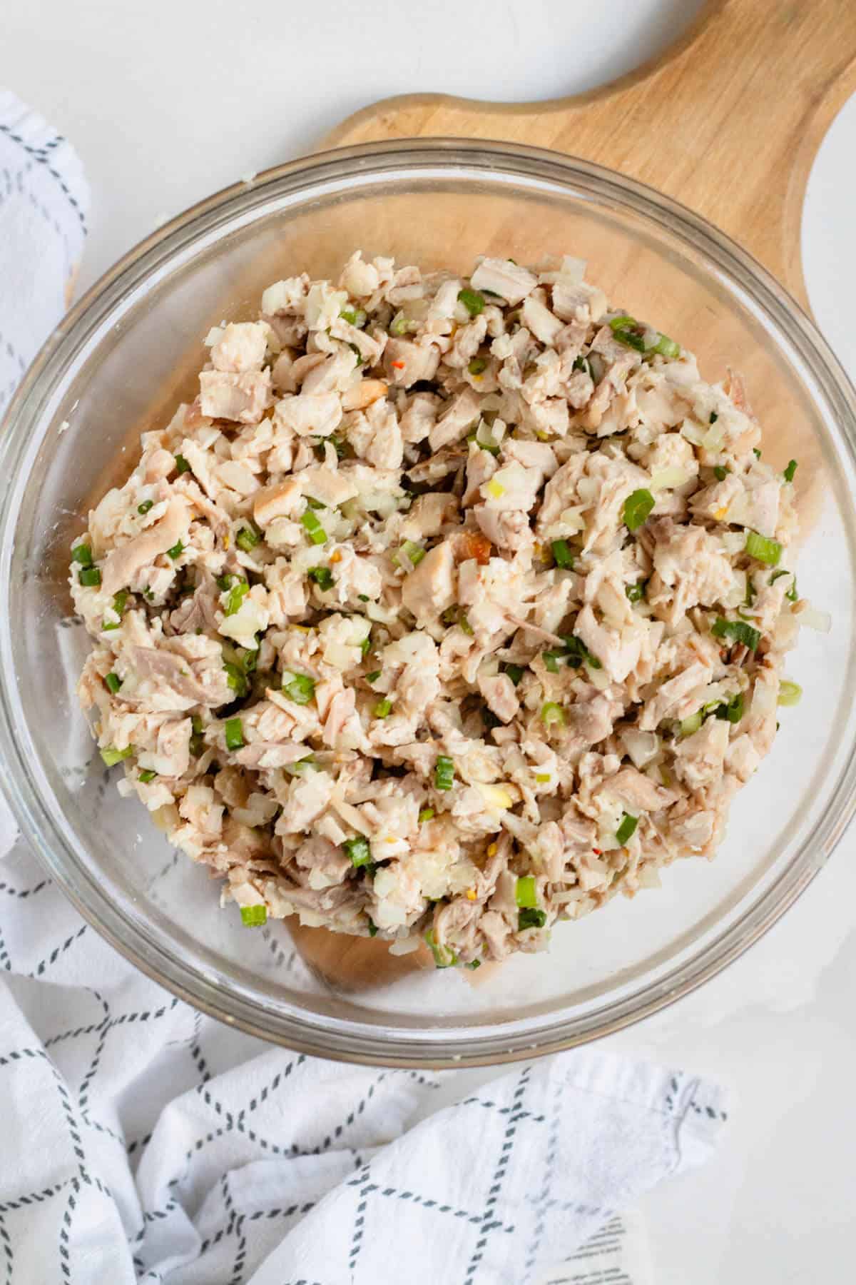 Fresh Chicken Kelaguen mixed with onions, green onions, and peppers.