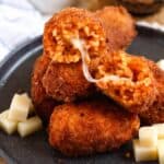 Crispy Roman fried rice balls stuffed with melted mozzarella.
