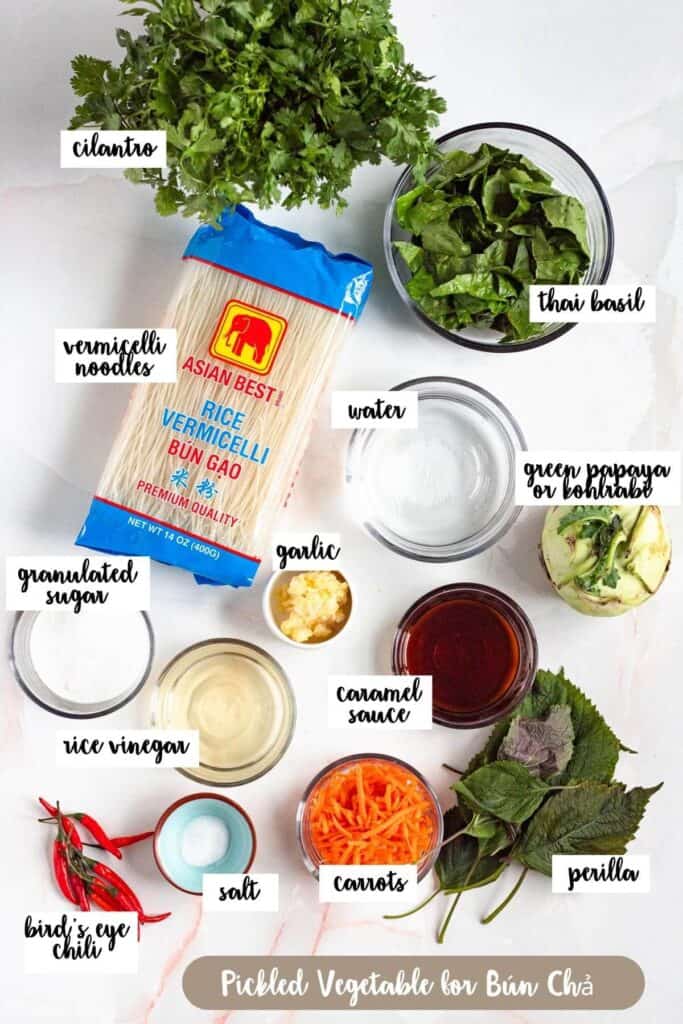 Labeled ingredient for pickled vegetables and broth for Bun Cha.