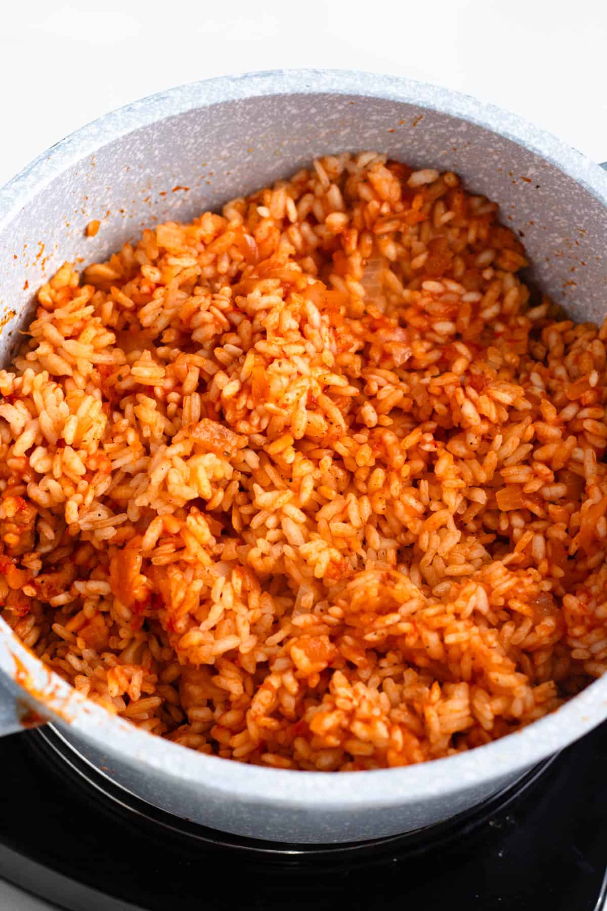 Arborio rice mixed with grated cheese.
