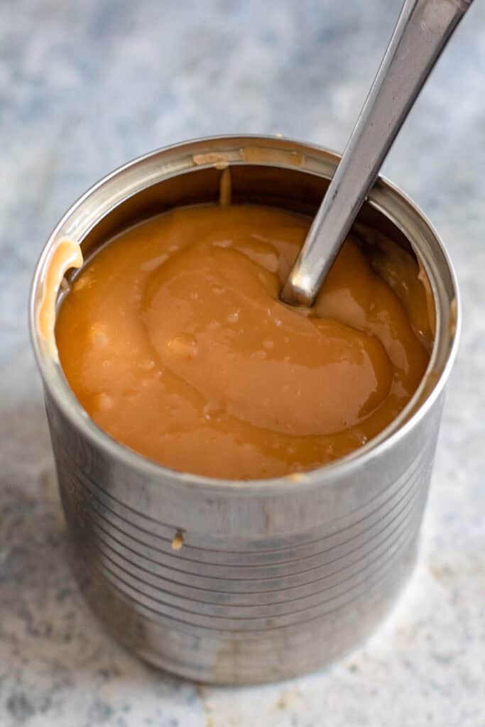 Homemade dulce de leche in the can after cooking in the Instant Pot.