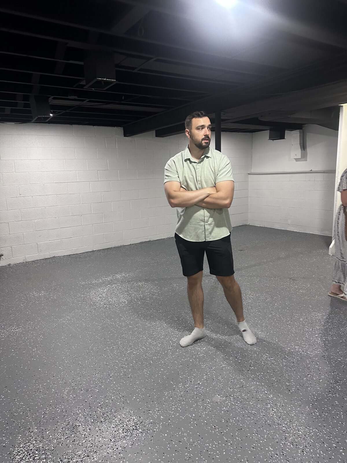 Matt in a basement of house tours. 