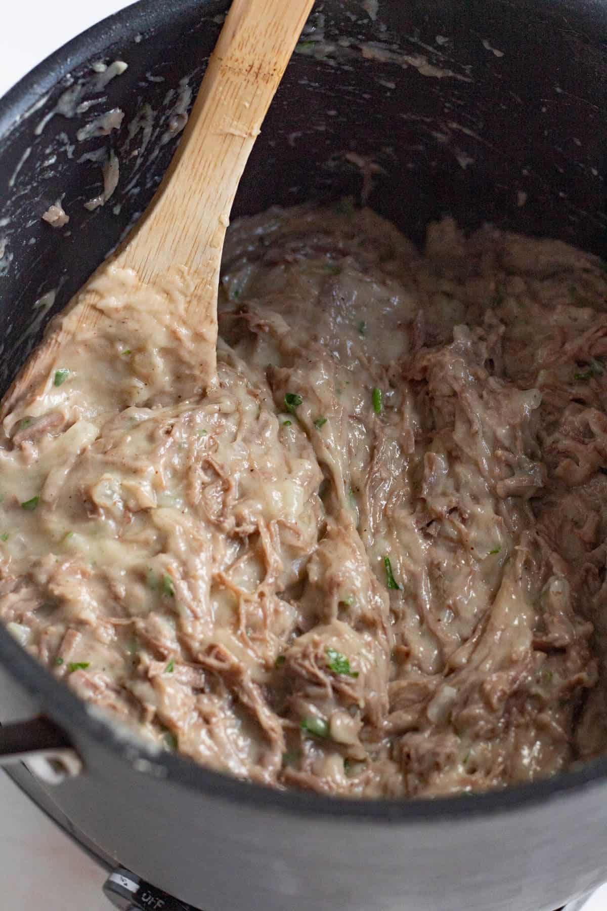 Chopped beef and parsley stirred into the creamy bitterballen filling.