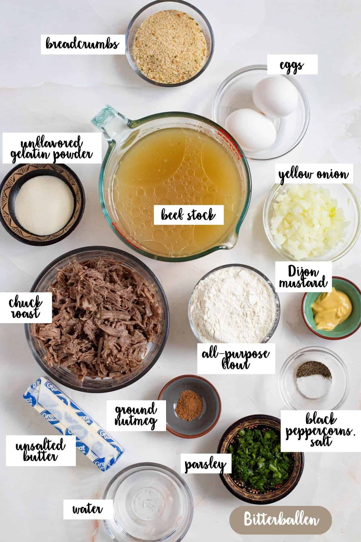 Top-down view of ingredients for bitterballen, including shredded beef, broth, flour, eggs, and butter.